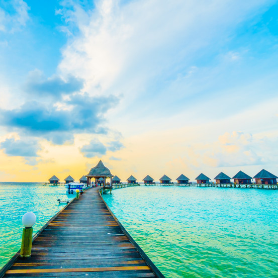 Beautiful tropical Maldives resort hotel and island with beach and sea on sky for holiday vacation 