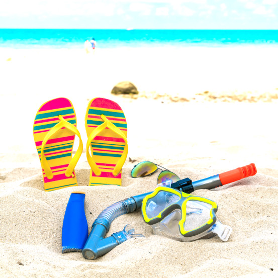 Scuba Diving On The White Sea Sand Beach