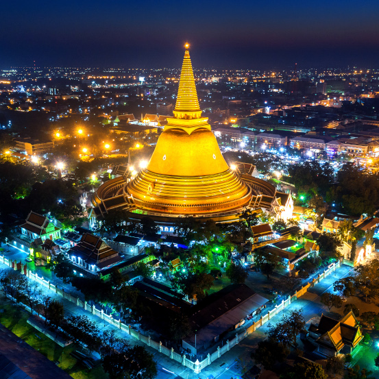 Aerial view of Beautiful Gloden pagoda at night. Phra Pathom Chedi temple in Nakhon Pathom Province, Thailand.